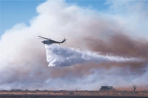 الطائرات تحاول إخماد حرائق الغابات فى كاليفورنيا