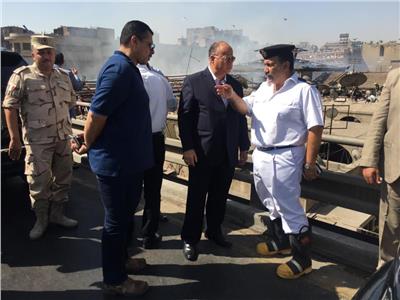 صور| محافظ القاهرة يتفقد حريق سوق الخضار بالعتبة.. ويوجه بإصلاح التلفيات