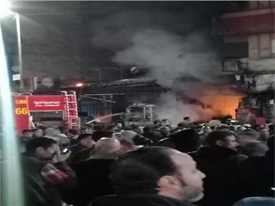 صور| إخماد حريق هائل في 3 محال بالإسكندرية