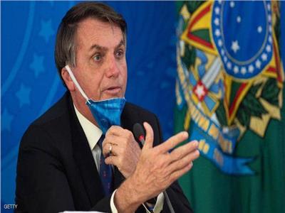 «رئيس البرازيل» يهدد بالانسحاب من منظمة الصحة العالمية