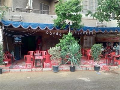 بالصور| مقاهي «بولاق الدكرور» تتزين لاستقبال روادها بعد أشهر الحظر