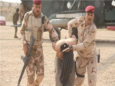 اعتقال 12 داعشيا في عملية أمنية جنوب الموصل بالعراق