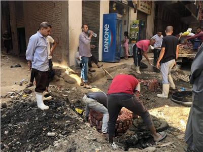 حملة موسعة لتطهير شبكات الصرف الصحي بشوارع بشتيل في «الجيزة» | صور