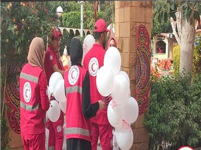 فرق الهلال الأحمر تشارك العائلات احتفالاتهم بعيد الفطر بالمنوفية
