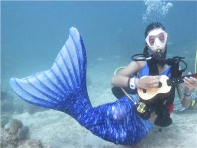 حفل موسيقي تحت الماء لحماية الشعاب المرجانية