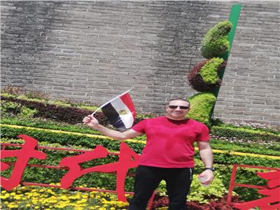 المصريين الأحرار يرفع علم مصر أعلى سور الصين العظيم 
