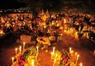 صور.. شموع وموسيقى و«جماجم بالسكر» احتفالاً بـ«يوم الموتى» في المكسيك