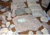 شرطة السياحة والآثار تتسلم 26 قطعة أثرية من مسروقات متحف ملوي 