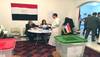 بالصور.. المصريون في البحرين يدلون  بأصواتهم في الانتخابات النيابية 