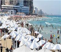 دقوا الشماسي| المصريون يهربون من الحر إلى الشواطئ .. صور