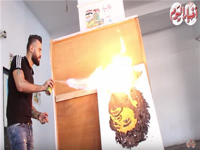 فيديو| «ألبير».. رسام على طريقة «اقلب الصورة تطلع حلوة»