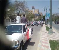 عمال شركة مطاحن مصر ينظمون مسيرة «في حب مصر» بالمنيا