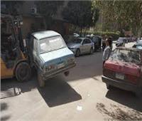 رفع السيارات المتهالكة من محيط مدارس العمرانية