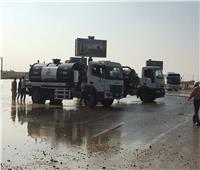 صور| استمرار جهود «النقل» التصدي لآثار الأمطار على الطرق