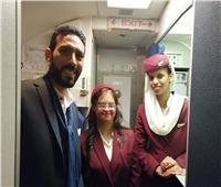 صور| «رحلة الإنسانية».. «هبة» أول مضيفة طيران مصرية من «متلازمة داون»
