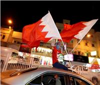 صور| شوارع المنامة تتزين بـ«الأحمر والأبيض» عقب تتويج البحرين بـ«خليجي 24»