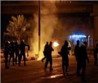العراق: محتجون يحرقون مقار أحزاب سياسية بالديوانية
