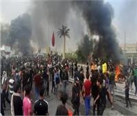 متظاهرون يقطعون جسرا ويغلقون دوائر حكومية بذي قار جنوب شرقي العراق
