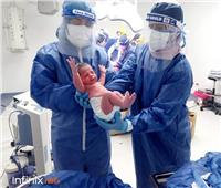 صور| ولادة قيصرية ناجحة لمريضة بمستشفى قها للحجر الصحي 