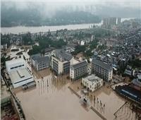 شاهد| بالتفاصيل.. مدينة صينية تشهد أسوأ فيضان منذ 100 عام