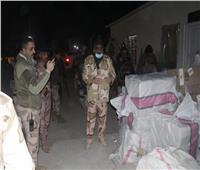 القوات العراقية تضبط حمولة بضائع مهربة.. صور