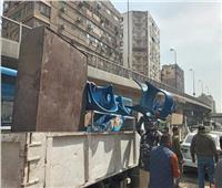 ضبط سيارات تلقي المخلفات بالشارع  في الجيزة