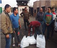 صندوق تحيا مصر يوزع وجبات و2.5 طن برتقال على عمال نظافة القاهرة