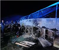 ارتفاع عدد ضحايا حادث تصادم طريق أسيوط البحر الأحمر إلى 18 وفاة | صور وفيديو