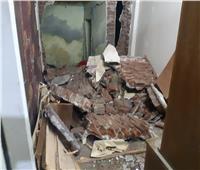 معاينة آثار انفجار أنبوبة غاز داخل شقة سكنية بفيصل | صور