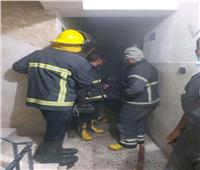 السيطرة على حريق شقة سكنية في أسيوط | صور