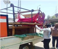 إزالة 39 حالة إشغال وإعلانات ومصادرة 20 طن مواد بناء بكوم أمبو