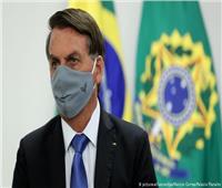 رئيس البرازيل يطلب من وزير الصحة تحديد موعد لإنهاء استخدام الكمامة