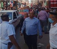 صور| حي غرب أسيوط يشن حملة لرفع الإشغالات بعدة شوارع