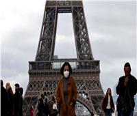 باريس تعيد فرض الكمامة مع الارتفاع الحاد في إصابات كوفيد 