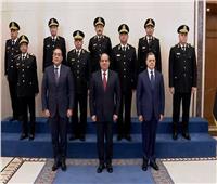 الرئيس السيسي يتوسط صورة تذكارية مع أعضاء المجلس الأعلى للشرطة