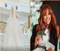 ظهور زوج مروة ناجي وفستان زفافها لأول مرة في أغنيتها «عايز تعرف»| فيديو   