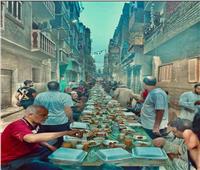 تحت شعار «بنحب بعض».. نجع «سعيد» بقنا ينظم أكبر مائدة إفطار جماعي | صور