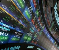 خسائر حادة وآمال بنهاية عام سعيدة بأسواق الأسهم العالمية