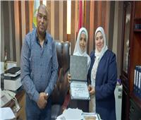 في لفتة طيبة .. رئيس مدينة أوسيم يُكرّم حفظة القرآن الكريم| صور