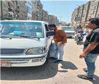 «سرفيس الجيزة»: ضبط 13 سيارة تقطع خط السير بـ «هضبة الأهرام»| صور