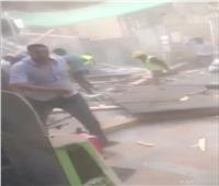 إصابة 3 أشخاص في سقوط سقالة خشبية بجوار محطة مترو فيصل| صور