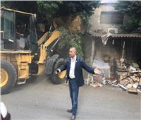 إزالة تعديات شارع «ميشيل باخوم» بجوار نادي الصيد بالدقي| صور
