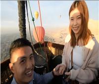على متن بالون طائر.. سائح صيني يتقدم للزواج من حبيبته بالأقصر| صورة
