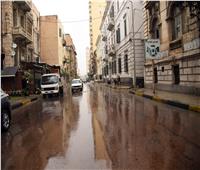 هطول أمطار غزيرة على أحياء الإسكندرية واستمرار حركة الملاحة