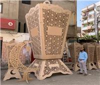 حكايات| مهندس الزراعة صنع أطول فانوس خشبي في مصر