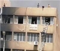 «أمن القاهرة» يستخدم سلالم لإنقاذ الموظفين في حريق جهاز 15 مايو
