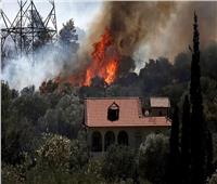 اخلاء المنتجعات الساحلية اليونانية بسبب حرائق الغابات التي أشعلتها الموجة الحارة| صور