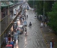 مصرع 11 عاملاً جراء انهيار جدار بسبب أمطار باكستان