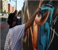 برسوم الجرافيتي.. 100 فنان من 28 دولة يزينون «الغابة الخرسانية» في بريشتينا