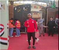 محمد علاء قوطة بطل التجديف يدلي بصوته في الانتخابات الرئاسية